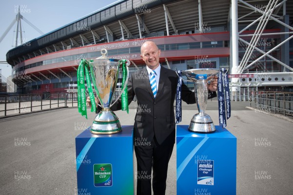 170713 - ERC 2014 Finals Announcement, Millennium Stadium, Cardiff -The announcement that the ERC 2014 Finals will be staged in Cardiff Pictured with the Heineken Cup and the Amlin Challenge Cup at the Millennium Stadium is Derek McGrath, ERC Chief ExecutivePicture issued for free editorial use by the ERC by Huw Evans Agency, Cardiff