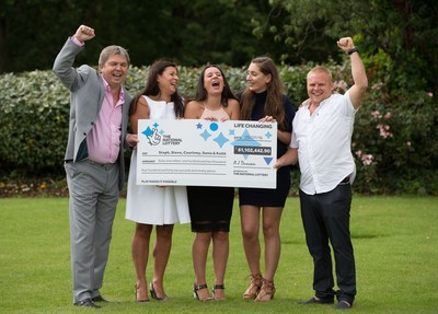 030816 -  EuroMillions Lottery Winners, Newport - EuroMillions Jackpot winners, left to right, Keith Reynolds, Sonia Davies, Stephanie Davies, Courtney Davies and Steve Powell of Monmouth celebrate their £61 million pound jackpot win