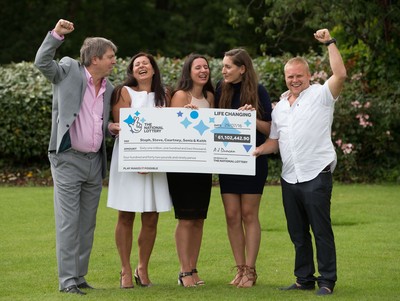 030816 -  EuroMillions Lottery Winners, Newport - EuroMillions Jackpot winners, left to right, Keith Reynolds, Sonia Davies, Stephanie Davies, Courtney Davies and Steve Powell of Monmouth celebrate their £61 million pound jackpot win