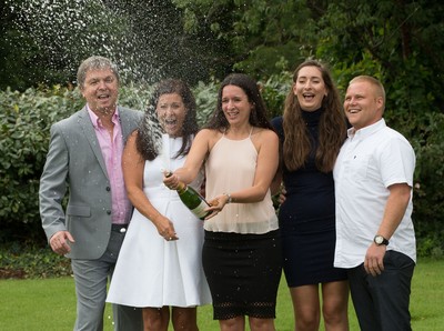 030816 -  EuroMillions Lottery Winners, Newport - EuroMillions Jackpot winners, left to right, Keith Reynolds, Sonia Davies, Stephanie Davies, Courtney Davies and Steve Powell celebrate their £61 million pound jackpot win