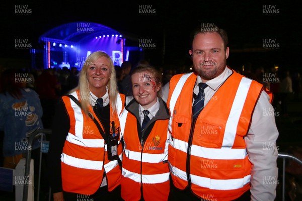 150918 - An Evening of ABBA at Sophia Gardens -  Safety stewards join in the fun during the concert 