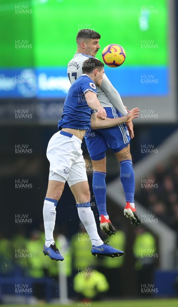 241118 - Everton v Cardiff City - Premier League -  Callum Paterson of Cardiff heads the ball before Michael Keene of Everton arrives