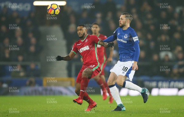 181217 - Everton v Swansea City, Premier League - Gylfi Sigurdsson of Everton and Luciano Narsingh of Swansea City compete for the ball