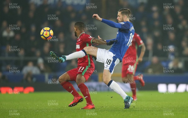 181217 - Everton v Swansea City, Premier League - Gylfi Sigurdsson of Everton and Luciano Narsingh of Swansea City compete for the ball