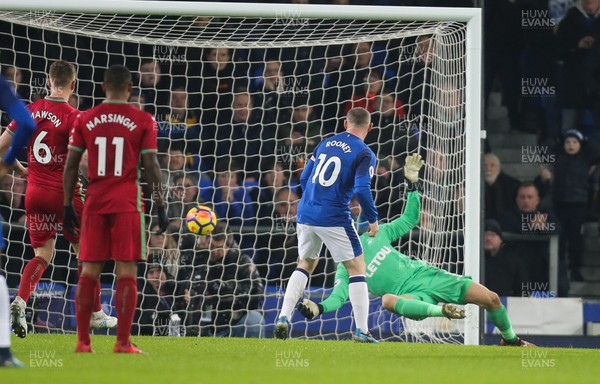 181217 - Everton v Swansea City, Premier League - Swansea City goalkeeper Lukasz Fabianski is beaten by  a shot from Dominic Calvert-Lewin of Everton after the saves the penalty from Wayne Rooney of Everton