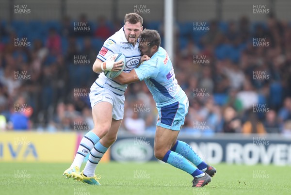 180818 - Exeter Chiefs v Cardiff Blues - Preseason Friendly - Owen Lane of Cardiff Blues is tackled by Phil Dollman of Exeter Chiefs