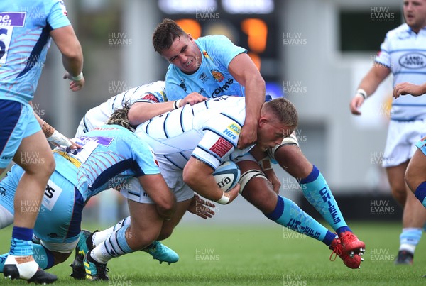180818 - Exeter Chiefs v Cardiff Blues - Preseason Friendly - Corey Domachowski of Cardiff Blues is tackled by Don Armand of Exeter Chiefs