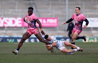 150225 - Exeter Chiefs v Gloucester Rugby - Premiership Cup Pool E - Paul Brown-Bampoe of Exeter is tackled by Charlie Chapman of Gloucester 