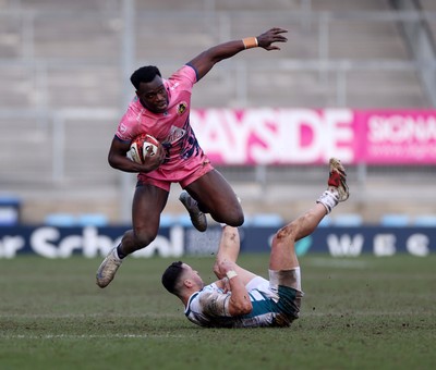 150225 - Exeter Chiefs v Gloucester Rugby - Premiership Cup Pool E - Paul Brown-Bampoe of Exeter is tackled by Charlie Chapman of Gloucester 