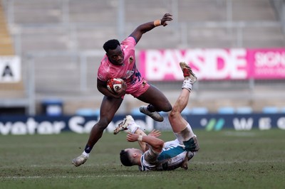 150225 - Exeter Chiefs v Gloucester Rugby - Premiership Cup Pool E - Paul Brown-Bampoe of Exeter is tackled by Charlie Chapman of Gloucester 