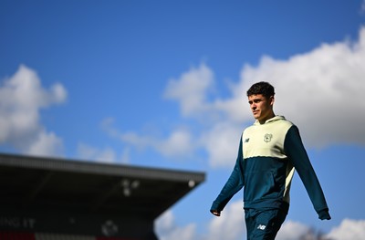 140326 - Exeter City v Cardiff City - Sky Bet League 1 - Players of Cardiff City walk the pitch ahead of kick off 