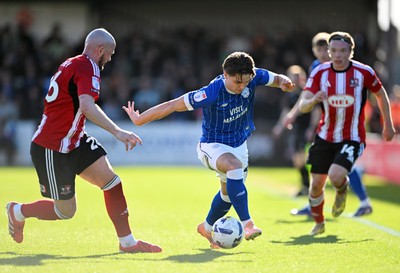 140326 - Exeter City v Cardiff City - Sky Bet League 1 - Cian Ashford of Cardiff City battles for possession with Pierce Sweeney of Exeter City