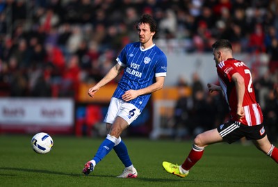 140326 - Exeter City v Cardiff City - Sky Bet League 1 - Ryan Wintle of Cardiff City battles for possession with Jack McMillan of Exeter City