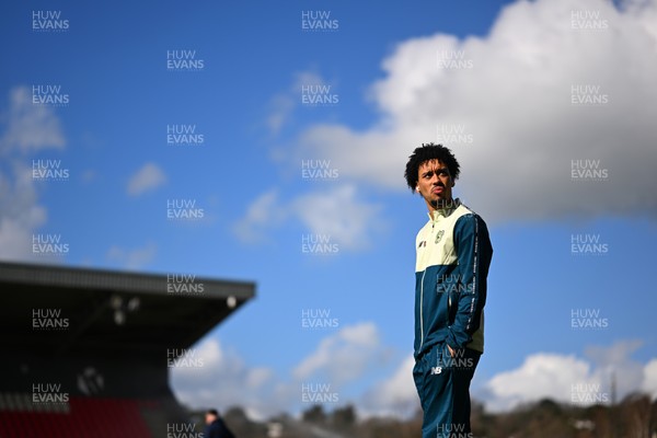 140326 - Exeter City v Cardiff City - Sky Bet League 1 - Calum Scanlon of Cardiff City walk the pitch ahead of kick off 