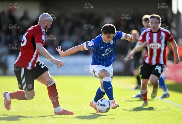 140326 - Exeter City v Cardiff City - Sky Bet League 1 - Cian Ashford of Cardiff City battles for possession with Pierce Sweeney of Exeter City