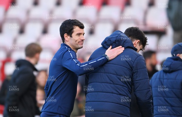 140326 - Exeter City v Cardiff City - Sky Bet League 1 - Brian Barry-Murphy, Manager of Cardiff City celebrates with Rubin Colwill of Cardiff City at the final whistle
