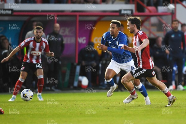160925 - Exeter City v Cardiff City - Vertu Trophy - Callum Robinson of Cardiff City is challenged by Ed Francis of Exeter