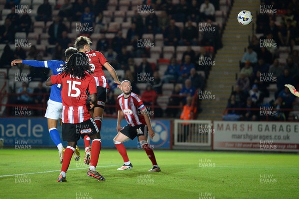 160925 - Exeter City v Cardiff City - Vertu Trophy - Callum Robinson of Cardiff City heads the ball to score the first goal of the game