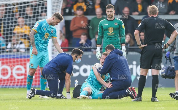161021 - Exeter City v Newport County, EFL Sky Bet League 2 - Matty Dolan of Newport County recieves treatment after picking up a knock