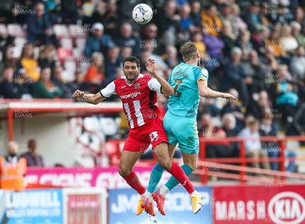 161021 - Exeter City v Newport County, EFL Sky Bet League 2 - Colin Daniel of Exeter City and Cameron Norman of Newport County compete for the ball