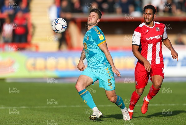 161021 - Exeter City v Newport County, EFL Sky Bet League 2 - James Clarke of Newport County holds off Sam Nombe of Exeter City