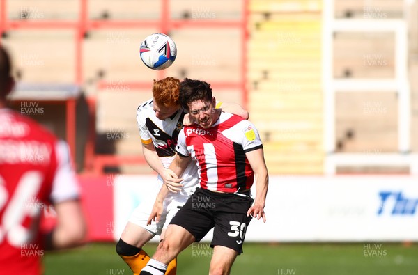 240421 - Exeter City v Newport County - Sky Bet League 2 - Ryan Haynes of Newport County and Josh Key of Exeter City compete for a high ball
