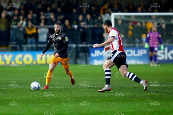 261219 - Exeter City v Newport County - EFL SkyBet League 2 - Josh Sheehan of Newport County takes on Tom Parkes of Exeter City 