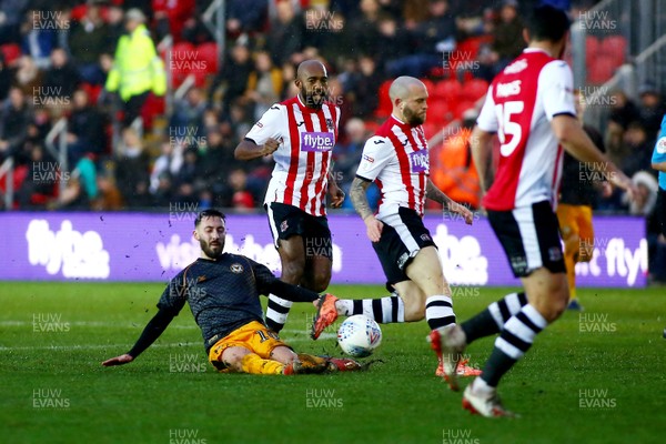 261219 - Exeter City v Newport County - EFL SkyBet League 2 - Josh Sheehan of Newport County is tackled by Nicky Law of Exeter City 