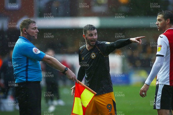 261219 - Exeter City v Newport County - EFL SkyBet League 2 - Padraig Amond of Newport County disagrees with assistant referee Robert Dabbs 