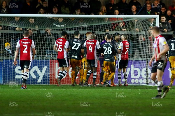 261219 - Exeter City v Newport County - EFL SkyBet League 2 - Tempers flare as players clash in the Newport County penalty area 