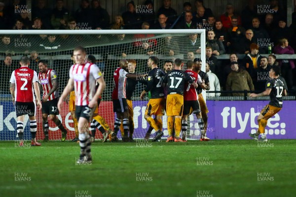 261219 - Exeter City v Newport County - EFL SkyBet League 2 - Tempers flare as players clash in the Newport County penalty area 
