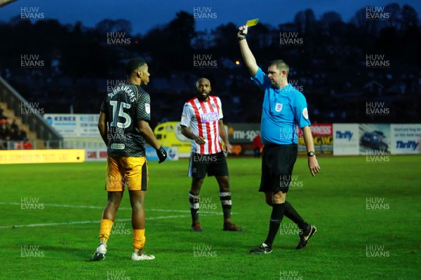 261219 - Exeter City v Newport County - EFL SkyBet League 2 - Tristan Abrahams of Newport County is booked by referee Brett Huxtable 