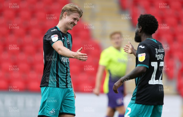 200719 - Exeter City v Swansea City - Pre Season Friendly - Nathan Dyer of Swansea City celebrates scoring a goal with George Byers