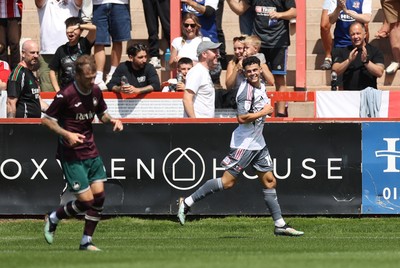 260725 - Exeter City v Swansea City - Pre Season Friendly - Sonny Cox of Exeter celebrates scoring a goal