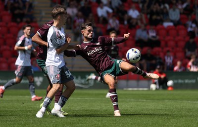260725 - Exeter City v Swansea City - Pre Season Friendly - Liam Cullen of Swansea takes a shot at goal