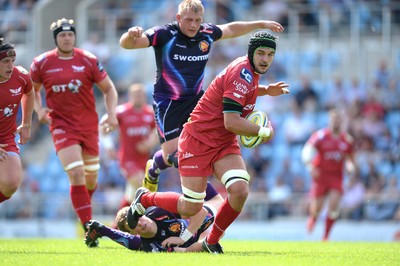 130816 - Exeter Chiefs v Scarlets - Preseason Friendly -Tom Price of Scarlets gets into space