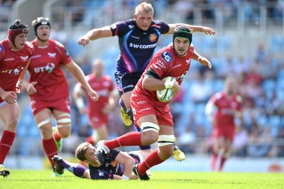 130816 - Exeter Chiefs v Scarlets - Preseason Friendly -Tom Price of Scarlets gets into space