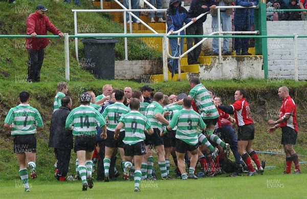 Collect pic  Spectator fights with rugby player A touch-line fight occured after Tonwamr lock Mervyn Meredith was attacked by a Cwmavon supporter after being  yellow carded by referee Michael Cox.  