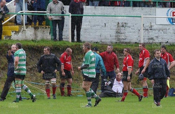 Collect pic  Spectator fights with rugby player. Cwmavon supporter recieved medical attention on the touch-line after he attacked Tonmawr lock Mervyn Meredith who had been yellow carded.  