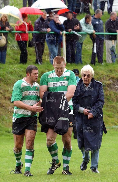 Collect pic......Rugby Spectator fights with player. Tonmawr rugby player Mervyn Meredith walks back to the changing room after he was attacked by a Cwmavon supporter on the touch-line after being yellow carded.  