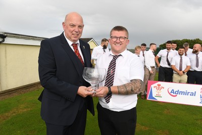 070625 - Ferndale RFC League Presentation - Admiral National League 4 East Central - WRU Rep Roy Wilkinson presents the trophy to Ferndale RFC Captain, Sam Hodder
