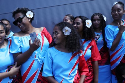 040726 - Fiji v Wales - Nations Championship - Fijian singers outside the stadium before the game