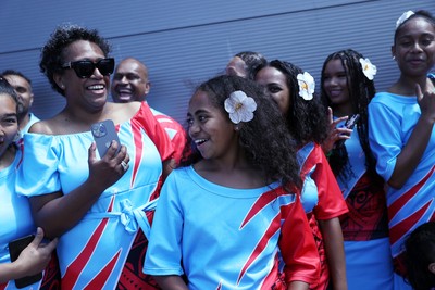 040726 - Fiji v Wales - Nations Championship - Fijian singers outside the stadium before the game