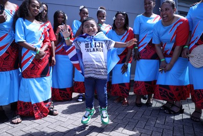 040726 - Fiji v Wales - Nations Championship - Fijian singers outside the stadium before the game
