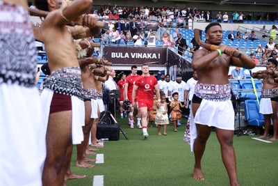 040726 - Fiji v Wales - Nations Championship - Dewi Lake of Wales leads the team out
