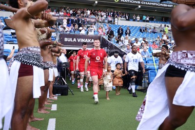 040726 - Fiji v Wales - Nations Championship - Dewi Lake of Wales leads the team out