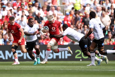 040726 - Fiji v Wales - Nations Championship - Aaron Wainwright of Wales is tackled by Temo Mayanavanua of Fiji 