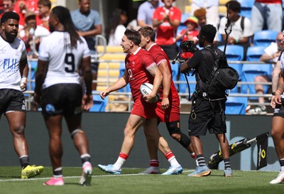 040726 - Fiji v Wales - Nations Championship - Josh Adams of Wales celebrates scoring a try