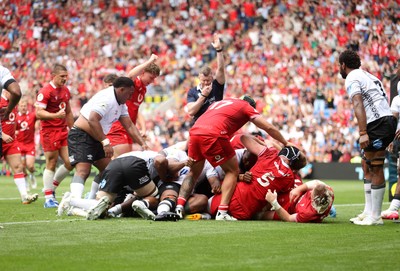 040726 - Fiji v Wales - Nations Championship - Aaron Wainwright of Wales gets over the line to score a try