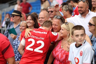 040726 - Fiji v Wales - Nations Championship - Sam Costelow of Wales with family at full time